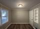 Cozy bedroom with hardwood floors and built-in shelving at 2028 Wells Sw Dr, Atlanta, GA 30311