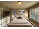 Spacious bedroom with a king-size bed and ample natural light at 2028 Wells Sw Dr, Atlanta, GA 30311