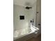 Updated bathroom with marble tile shower and large bathtub at 2662 Sweetwater St, Austell, GA 30106