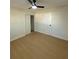 Spacious bedroom with light flooring and ceiling fan at 2662 Sweetwater St, Austell, GA 30106