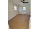 Bright bedroom with ceiling fan and light oak flooring at 2662 Sweetwater St, Austell, GA 30106