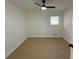 Bright bedroom with light flooring and ceiling fan at 2662 Sweetwater St, Austell, GA 30106