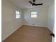 Spacious bedroom featuring light wood floors and large windows at 2662 Sweetwater St, Austell, GA 30106