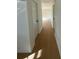 Light and bright hallway with light oak flooring at 2662 Sweetwater St, Austell, GA 30106