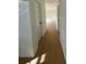 Bright hallway with light flooring and doors to rooms at 2662 Sweetwater St, Austell, GA 30106