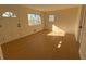 Light-filled living room with hardwood floors at 2662 Sweetwater St, Austell, GA 30106