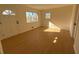 Bright living room featuring light wood flooring and lots of natural light at 2662 Sweetwater St, Austell, GA 30106