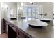 Double vanity bathroom with concrete countertop at 2853 N Hills Ne Dr, Atlanta, GA 30305