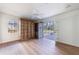 Hardwood floor bedroom with built-in shelves and deck access at 2853 N Hills Ne Dr, Atlanta, GA 30305