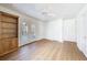 Spacious bedroom with hardwood floors and access to a deck at 2853 N Hills Ne Dr, Atlanta, GA 30305