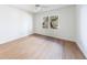 Bright bedroom featuring hardwood floors and large window at 2853 N Hills Ne Dr, Atlanta, GA 30305