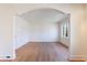 Bright dining room featuring hardwood floors and an arched entryway at 2853 N Hills Ne Dr, Atlanta, GA 30305