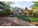 House exterior showcasing a stone fireplace and deck at 2853 N Hills Ne Dr, Atlanta, GA 30305