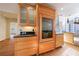 Modern kitchen with wood cabinets and stainless steel appliances at 2853 N Hills Ne Dr, Atlanta, GA 30305