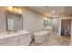 Primary bathroom with a soaking tub, double vanity, and walk-in shower at 324 Concord St, Alpharetta, GA 30009