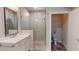 Stylish bathroom with a walk-in shower, modern fixtures, and a separate toilet at 324 Concord St, Alpharetta, GA 30009