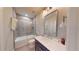 Bathroom with a tiled shower/tub combo, single vanity, and lots of countertop space at 324 Concord St, Alpharetta, GA 30009