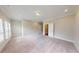 Spacious bedroom with neutral carpet, and plantation shutters at 324 Concord St, Alpharetta, GA 30009