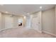 Large bonus room with neutral walls, plush carpeting, and two doors leading to other rooms at 324 Concord St, Alpharetta, GA 30009