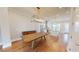 Dining area showcasing hardwood floors and an open floorplan that flows into kitchen at 324 Concord St, Alpharetta, GA 30009