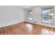 Hardwood floor bedroom with two windows and ample wall space at 1892 Mercedes Ne Ct, Atlanta, GA 30345