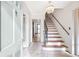 Bright entryway with marble flooring and staircase at 1892 Mercedes Ne Ct, Atlanta, GA 30345