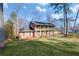 Two-story house with a spacious yard and mature trees at 1892 Mercedes Ne Ct, Atlanta, GA 30345