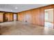 Gathering room features wood paneling, fireplace and lots of natural light at 1892 Mercedes Ne Ct, Atlanta, GA 30345