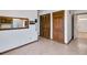 Bright hallway with wood doors and access to other rooms at 1892 Mercedes Ne Ct, Atlanta, GA 30345