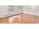 Bright living room with hardwood floors and large windows at 1892 Mercedes Ne Ct, Atlanta, GA 30345