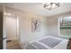 Neutral bedroom featuring calming wall art and natural light at 1122 Dobbs Se Dr, Atlanta, GA 30316