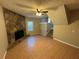 Living room features a stone fireplace and tile flooring at 3959 Wood Path Dr, Stone Mountain, GA 30083