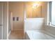 Bathroom with shower/tub combo and a separate shower at 8103 White Oak Loop, Lithonia, GA 30038