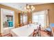 Bright dining room with hardwood floors and built-in hutch at 4212 Mcgregor Way, Acworth, GA 30101