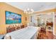 Formal dining room with chandelier and view into living room at 4212 Mcgregor Way, Acworth, GA 30101