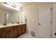 Bathroom with double sink vanity, great lighting, and a tiled floor at 200 Claret Way, Mcdonough, GA 30252