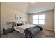 Beautiful bedroom with modern decor, a soft color palette, and ample natural light at 200 Claret Way, Mcdonough, GA 30252