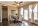 Bright dining area with modern table set and natural light from the windows and door at 200 Claret Way, Mcdonough, GA 30252