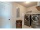 Convenient laundry room with new washer and dryer at 200 Claret Way, Mcdonough, GA 30252