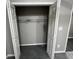 A bedroom closet with shelving has ample space for storage at 2755 Berry Rd, Loganville, GA 30052