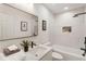 Modern bathroom with white tile and updated fixtures at 2605 Bobo Rd, Dallas, GA 30157