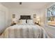 Spacious bedroom with large window and neutral decor at 2605 Bobo Rd, Dallas, GA 30157