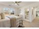 Main bedroom with ensuite bathroom and backyard views at 2605 Bobo Rd, Dallas, GA 30157