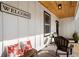 Relaxing front porch with wooden ceiling and seating at 2605 Bobo Rd, Dallas, GA 30157