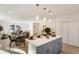 Open concept kitchen features a large island and modern gray cabinets at 2605 Bobo Rd, Dallas, GA 30157