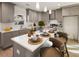 Kitchen island with seating for four and white quartz countertops at 2605 Bobo Rd, Dallas, GA 30157