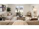 Bright living room with two sofas and large windows at 2605 Bobo Rd, Dallas, GA 30157