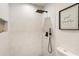Clean and modern shower with marble tile and black accents at 2605 Bobo Rd, Dallas, GA 30157