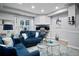 Finished basement with two sofas, neutral walls, and luxury vinyl flooring at 456 Crestmont Ln, Canton, GA 30114