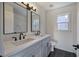 Modern bathroom with double vanity and subway tile at 1005 Middlebrooke Dr, Canton, GA 30115